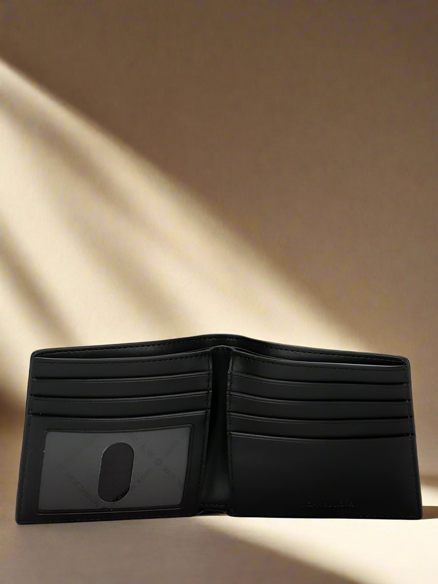 Black leather wallet on a white background