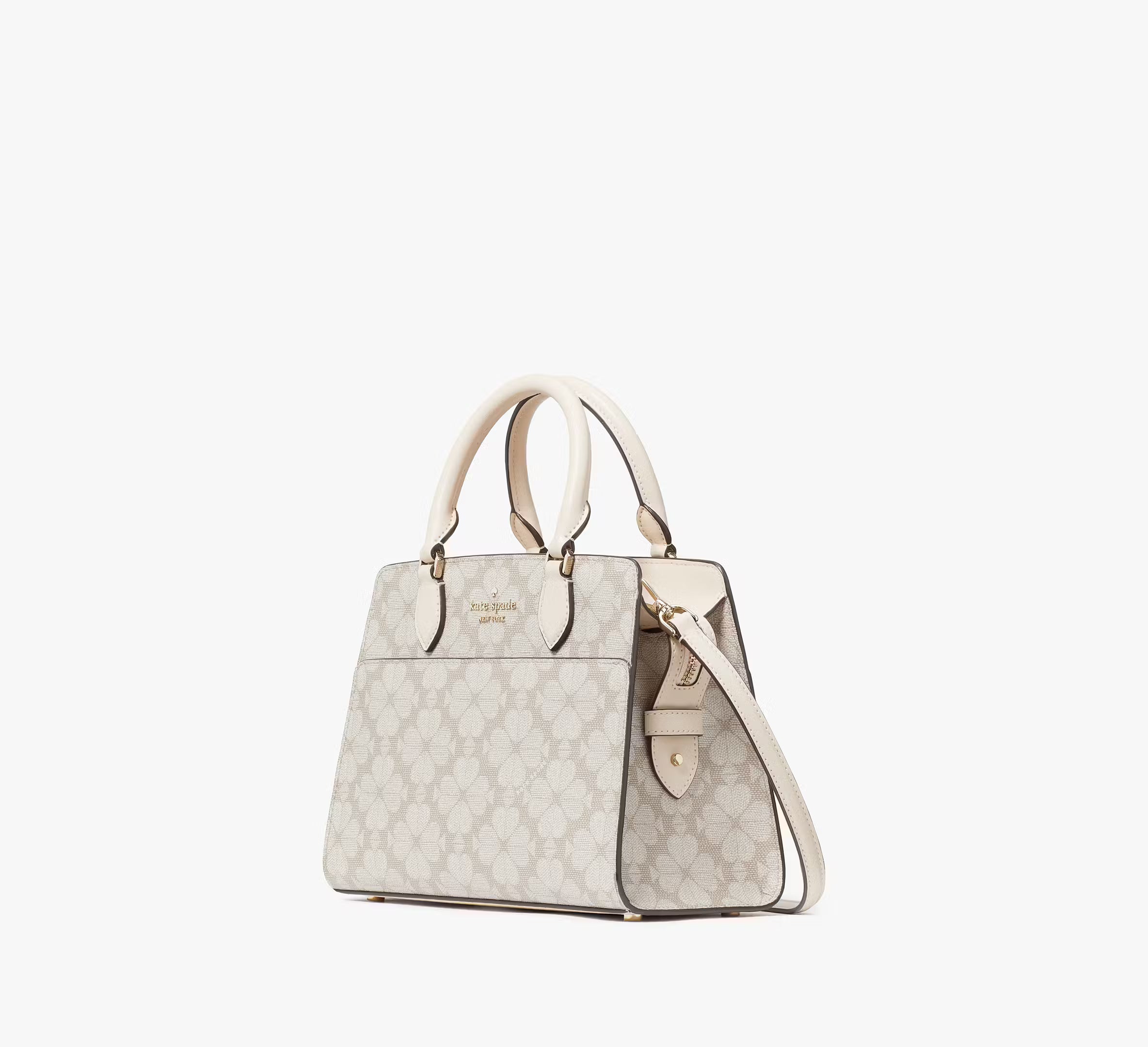 White handbag with a subtle pattern on a white background